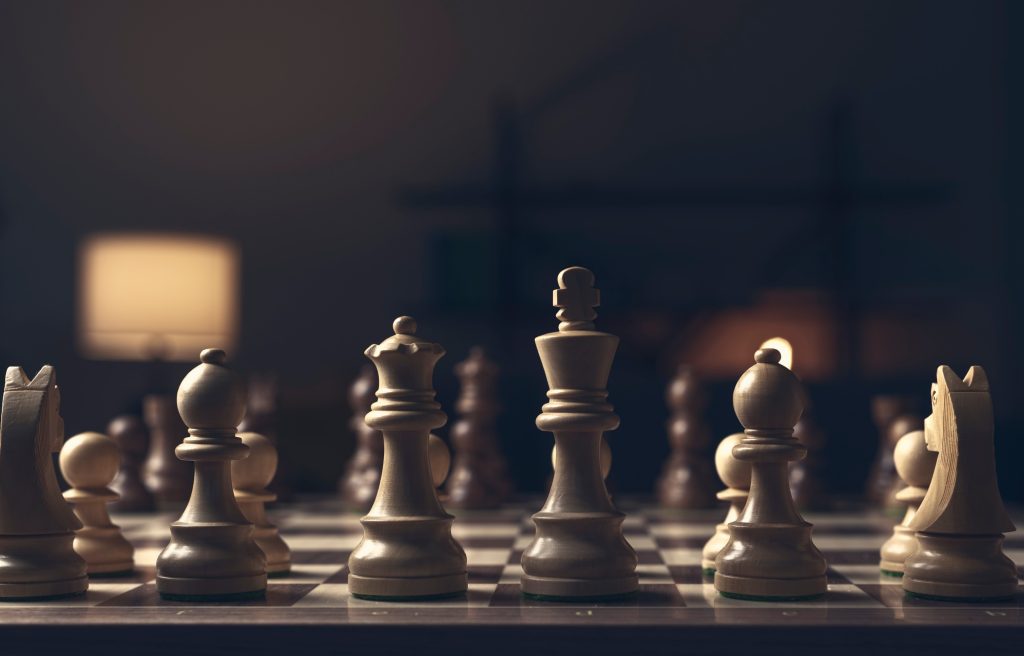 Chess pieces arranged on the chessboard